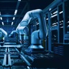 A futuristic factory with robotic arms assembling electronic components.