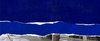 The image features a bold blue torn paper design juxtaposed with a city street view.