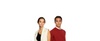 A man and a woman standing side by side in fashionable attire.