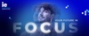 A promotional banner for IE Business School featuring a young man with the text 'Your Future In Focus'.
