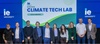 A group of winners from the Climate Tech Lab at IE University is posing for a photo.