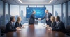 Two business professionals shake hands in a modern conference room with a city view.