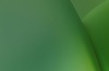 A smooth gradient featuring various shades of green.
