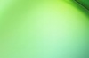A smooth gradient of green colors blending together.