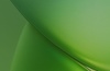 A smooth gradient of green shades blending together.