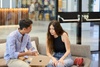 Two IE student looking to  a computer