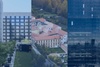A collage of modern and historical architecture in an urban setting.