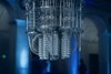 A sophisticated quantum computer showcased in a modern setting.