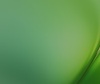 A smooth gradient of green colors blending together.