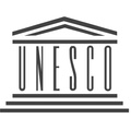 The logo of UNESCO featuring a stylized representation of a building.