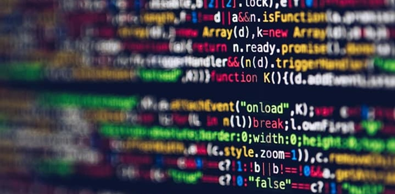 Close-up view of colorful computer programming code on a screen.