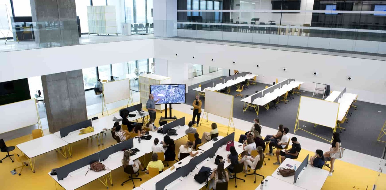 view from above of a class in which there are students of design and archictecture studies