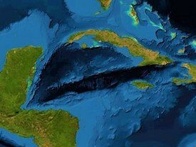 Satellite image showing a topographic view of Central America with the Caribbean Sea prominently visible.