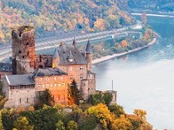 A picture of The Katz Castle with the Rhin River in the background is the symbol of the German IE Club