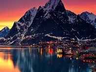 A Picture of The Lofoten Mountains with a sunset in the back is the image that representes the IE Norway Club