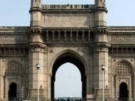 Image of the Gateway of India, a large arch monument in Mumbai.