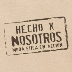 The image shows a logo with the text 'HECHO X NOSOTROS, MODA ETICA EN ACCION' printed on a textured paper background.
