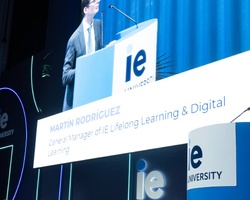 A speaker giving a presentation at an event.