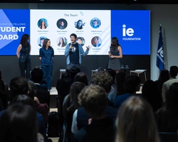 A group of presenters speaking at a student board event.