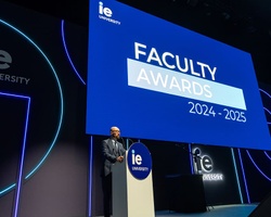 A presentation at a university event showcasing the Faculty Awards for 2024-2025.