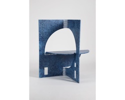 A small blue chair-shaped bookshelf with a semi-circle cutout and a single shelf, displayed against a white background.