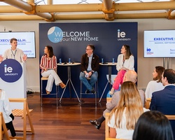 A panel discussion at an event for a university audience.