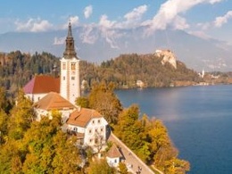 The image that represnets the IE Alumni Slovenia Club is The Lake Bled, It is an interesting place for tourists in Slovenia.