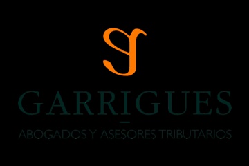 The image displays the logo of Garrigues, which is styled with an orange letter 'G' and the name 'Garrigues' below it, followed by the text 'Abogados y Asesores Tributarios' in Spanish.