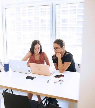 IE students with a computer