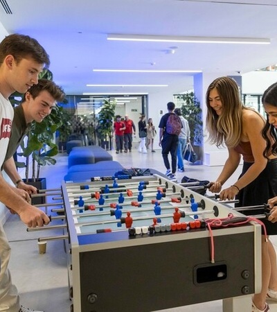 IE students playing  table football at IE tower