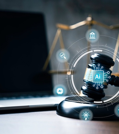 A digital gavel surrounded by technology icons representing artificial intelligence in a legal context.
