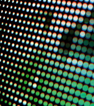 Close-up view of a digital screen showing a pattern of colorful dots.