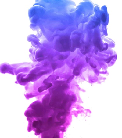 A vibrant, swirling cloud of purple and pink ink suspended in water.