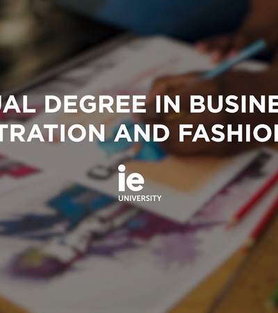 A person is working on design sketches for a dual degree in business administration and fashion design.