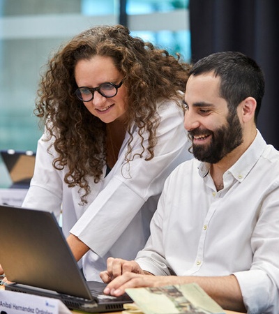 Global Executive MBA student paying attention during a class