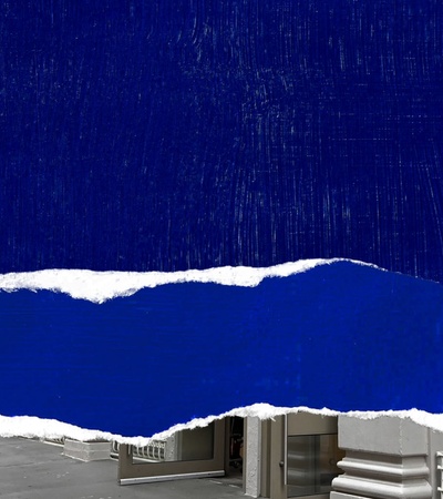 A creative composition featuring a torn blue background with a street view partially visible beneath.