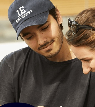 A young couple is enjoying a moment together outdoors, engaged in a friendly activity.