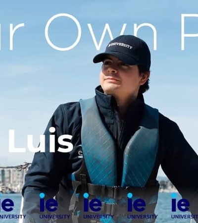 A man in sailing gear looks confidently towards the horizon on a boat, with text overlay 'Your Own Path With José Luis' and multiple 'university' logos.