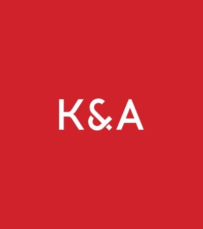 This image features the text 'K&A' on a red background.