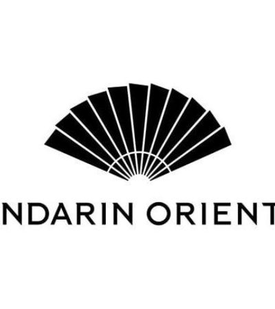 A black and white logo featuring a fan design with the words 'Mandarin Oriental' below it.