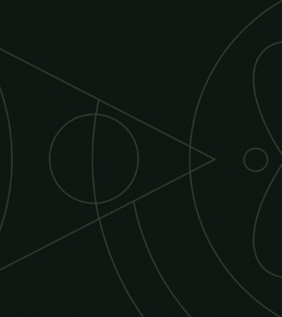 A dark background featuring geometric and atomic shapes.