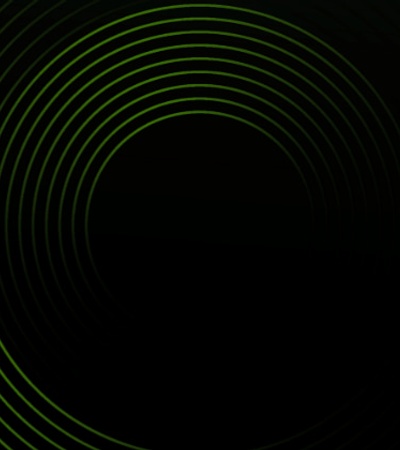 An abstract image featuring concentric circles with green neon glow on a dark background.