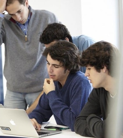 SST students looking the  computer