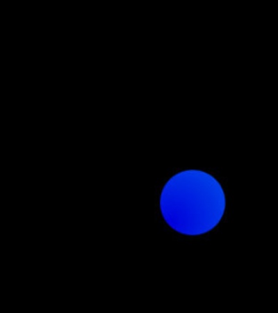 The image features several blue spheres against a black background.