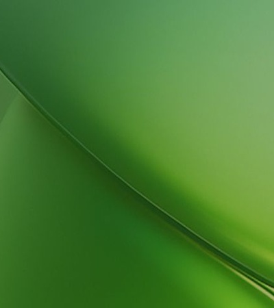 A smooth gradient of green shades blending together.