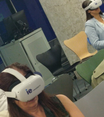 People in a classroom wearing virtual reality headsets