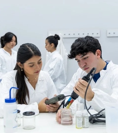 Two students are conducting an experiment in a laboratory.