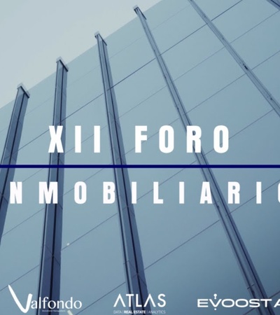 A modern building showcasing a real estate forum event.