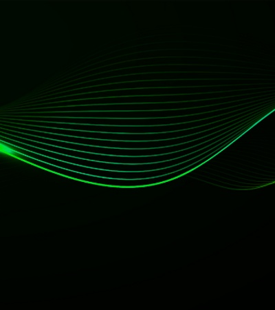 Abstract image featuring smooth waving lines in green against a dark background.