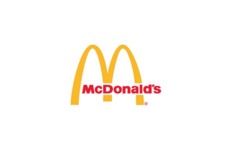 The image shows the McDonald's logo, featuring its iconic golden arches above the red-colored brand name.